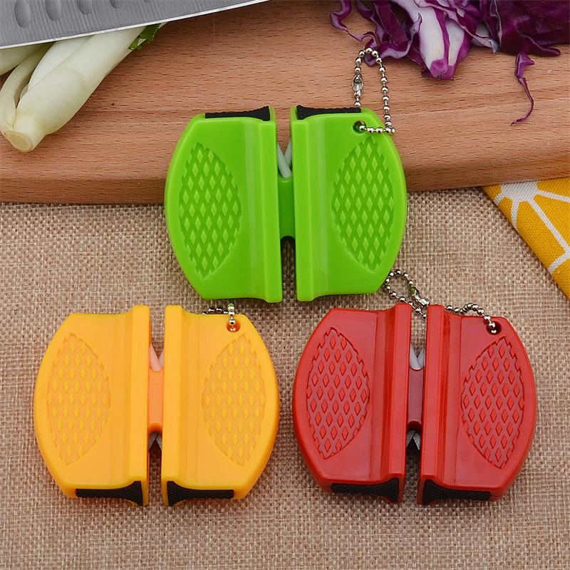 https://prochefclub.com/cdn/shop/products/Portable-Mini-kitchen-Knife-Sharpener-Kitchen-Tools-Accessories-Creative-Butterfly-Type-Two-stage-Camping-Pocket-Knife_d5738153-da3d-4161-b8e8-f198e234d6a8.jpg?v=1589961009&width=1445